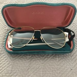 Gucci clear lensed glasses.